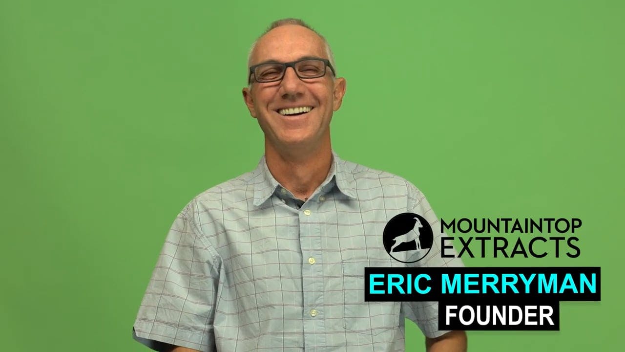 a photo of Eric Merryman, Founder of Mountaintop Extracts, in front of a green screen.